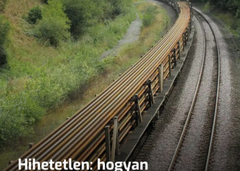 Hogyan kanyarodik egy vonat a 800 méteres sínek szállítása közben, és miért nem törnek el?